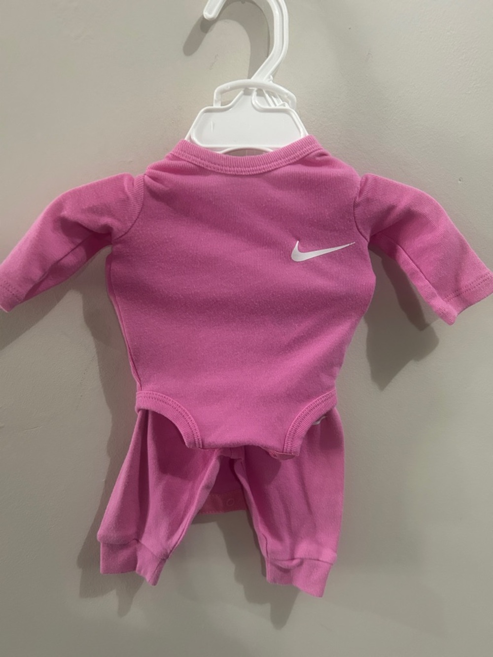 Nike Pink Infant Footed One-Piece with White Swoosh